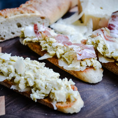 Artichoke Crostini with Parmesan and Proscuitto